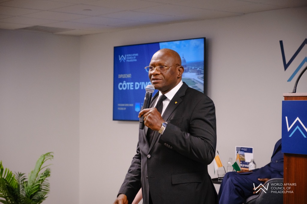His Excellency Ibrahima Touré, Ambassador of Côte d'Ivoire, speaking at the podium during Diplochat: Côte d'Ivoire, World Affairs Council of Philadelphia, June 11, 2026